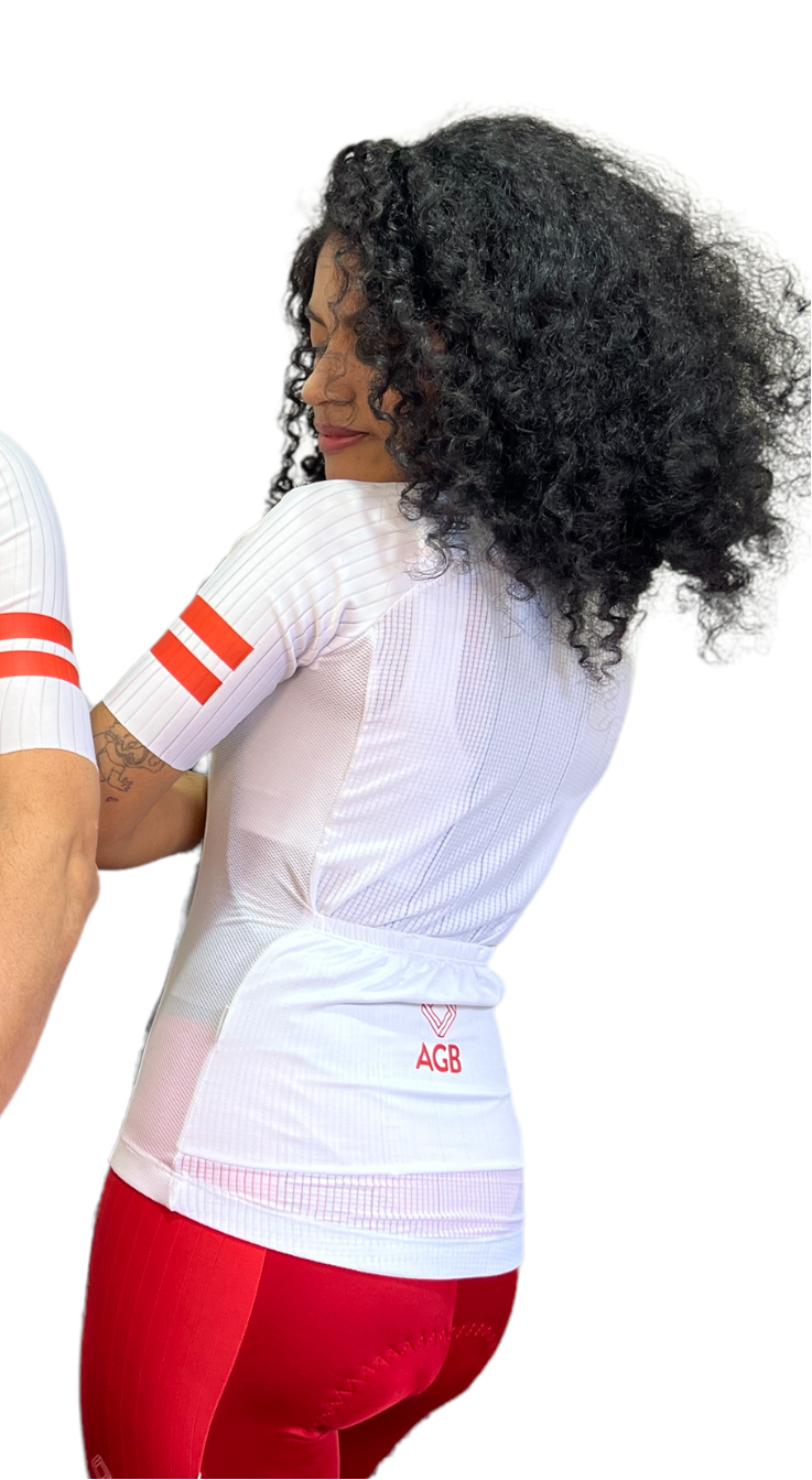 Jersey de ciclismo Pro blanco para dama vista trasera con punto reflectivo de A Guapa Bike.