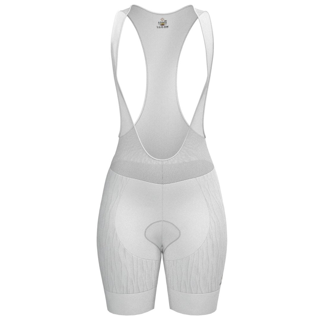 Licra corta de ciclismo blanca para mujer de la línea Pro vista frontal con tirantes de malla de A Guapa Bike.