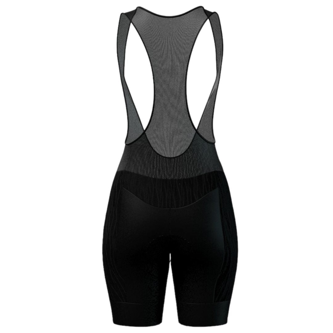 Licra corta de ciclismo negra para mujer vista trasera con corte en media luna para moldear la cola de A Guapa Bike.