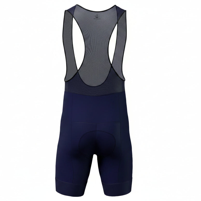 Licra corta de ciclismo azul oscuro para hombre de la línea Pro vista trasera con tirantes en red ultra transpirables de A Guapa Bike.