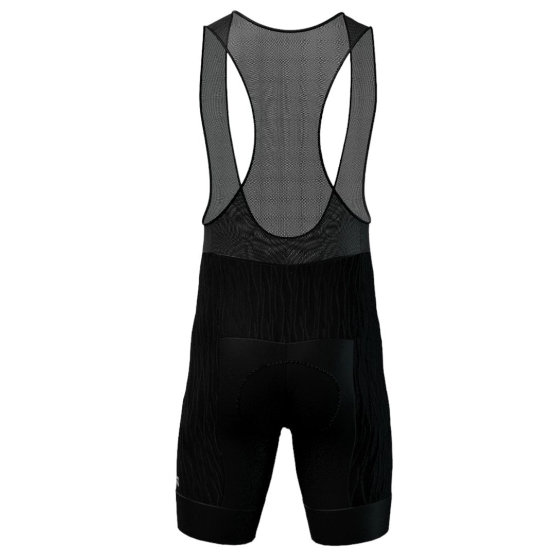 Licra corta de ciclismo negra para hombre de la línea Pro render espalda con banda siliconada y tirantes en malla de A Guapa Bike.
