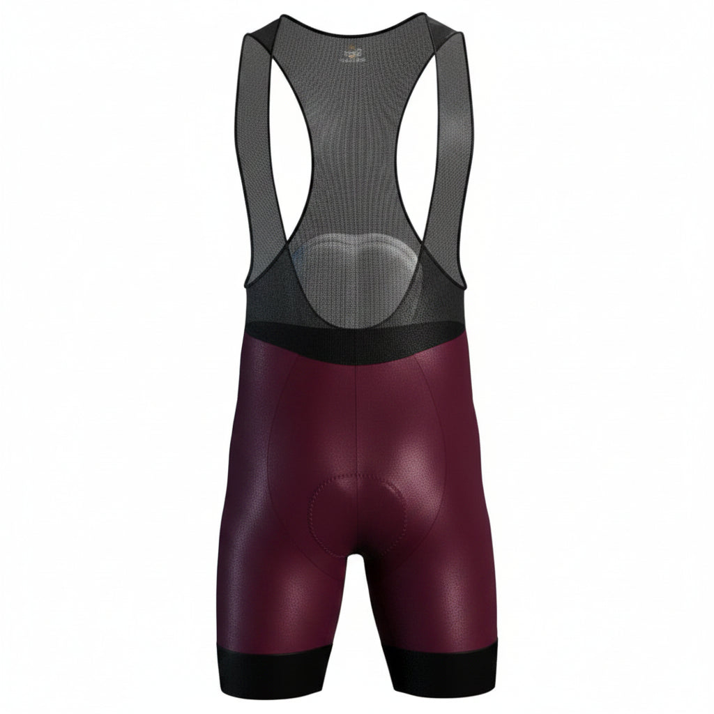 Licra corta de ciclismo vinotinto para hombre de la línea Pro vista frontal con tirantes de malla de A Guapa Bike.
