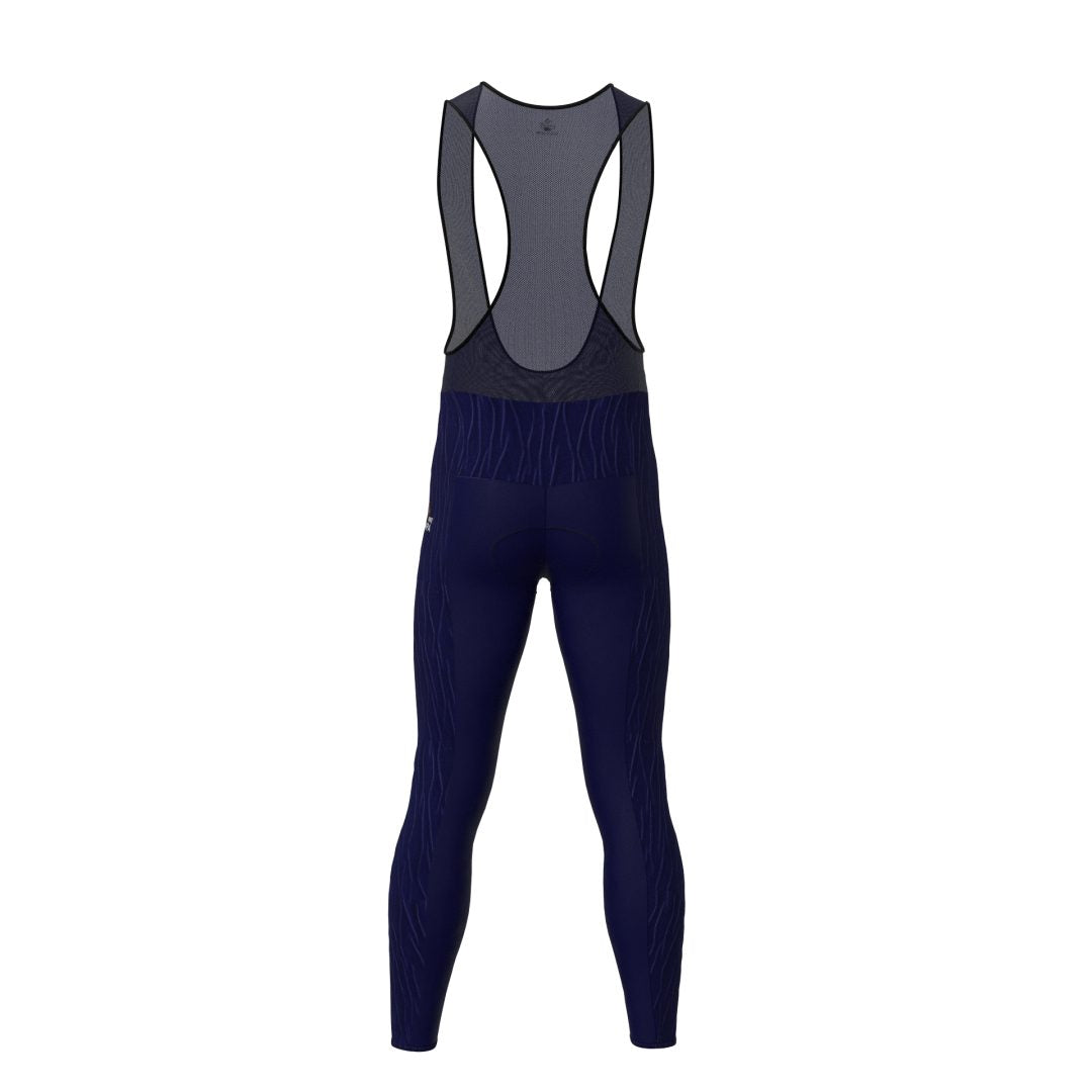 Licra larga de ciclismo azul oscuro para hombre de la línea Pro vista trasera con tirantes en red ultra transpirables de A Guapa Bike.